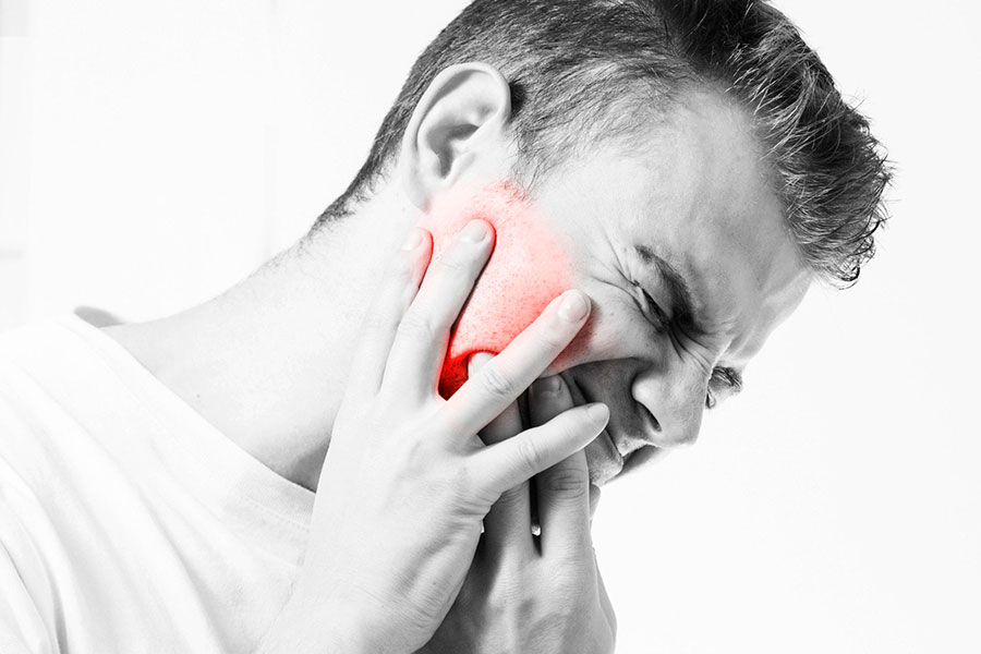 Болит зуб под коронкой: причины и способы лечения